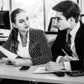 black and white person in the office